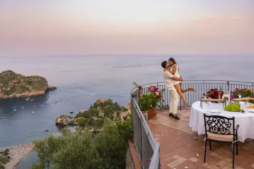 proposal-taormina-couple-isola-bella-view.webp