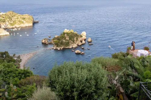 proposal-taormina-isola-bella-cliffside-terrace-view.webp