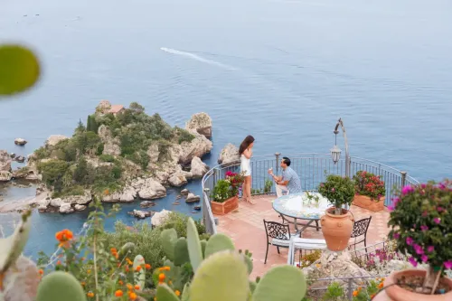 proposal-taormina-isola-bella-cliffside-terrace.webp