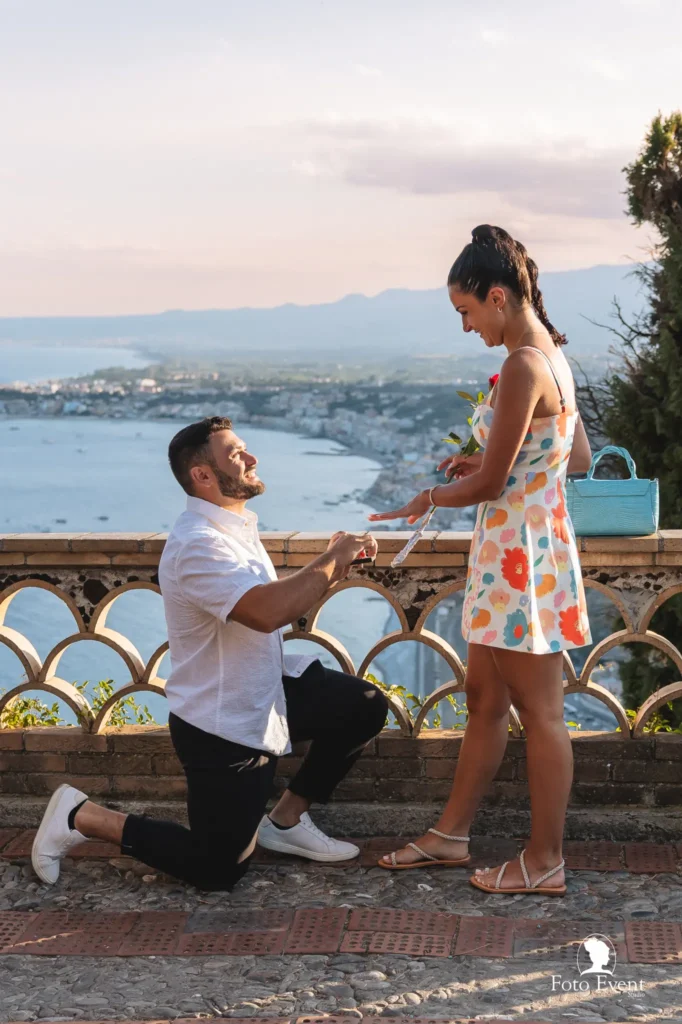 surprise proposal Taormina public park man on one knee