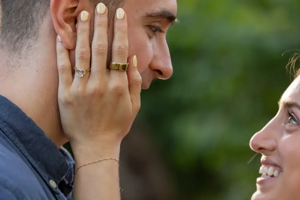 Hidden photographer proposal in Taormina ring portrait after the yes