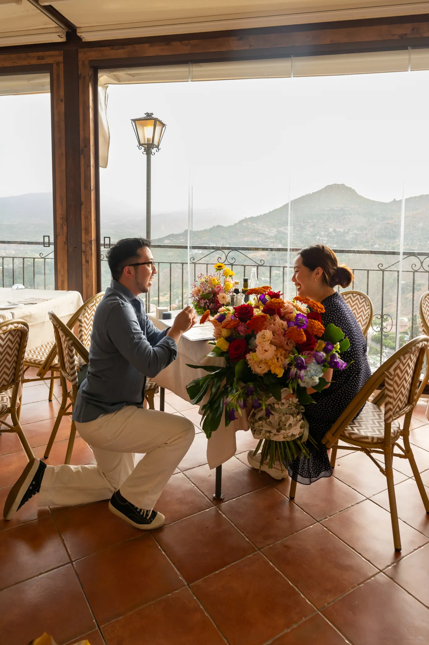 proposal Al Saraceno Taormina Timothy on one knee Etna view rainy day