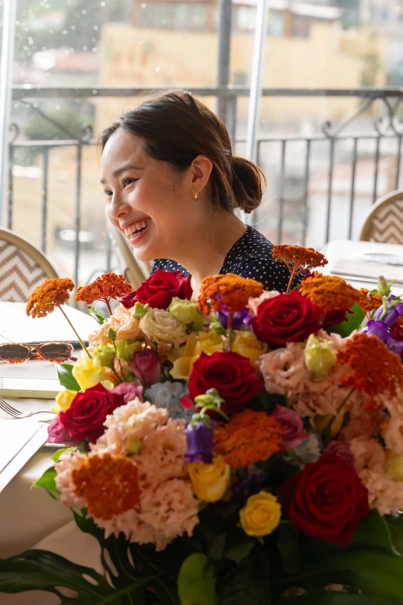 surprise proposal reaction flowers Al Saraceno Taormina restaurant Etna view
