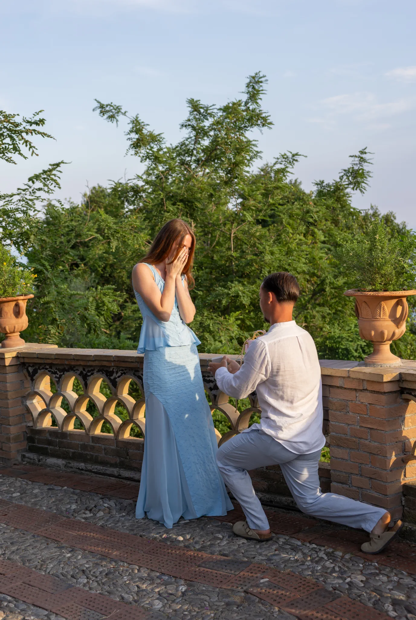 surprise kneeling proposal reaction free spot Taormina