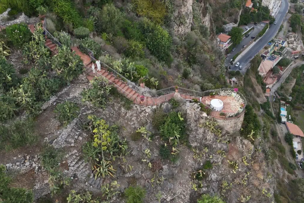 Aerial drone view of a private terrace proposal setup in Taormina