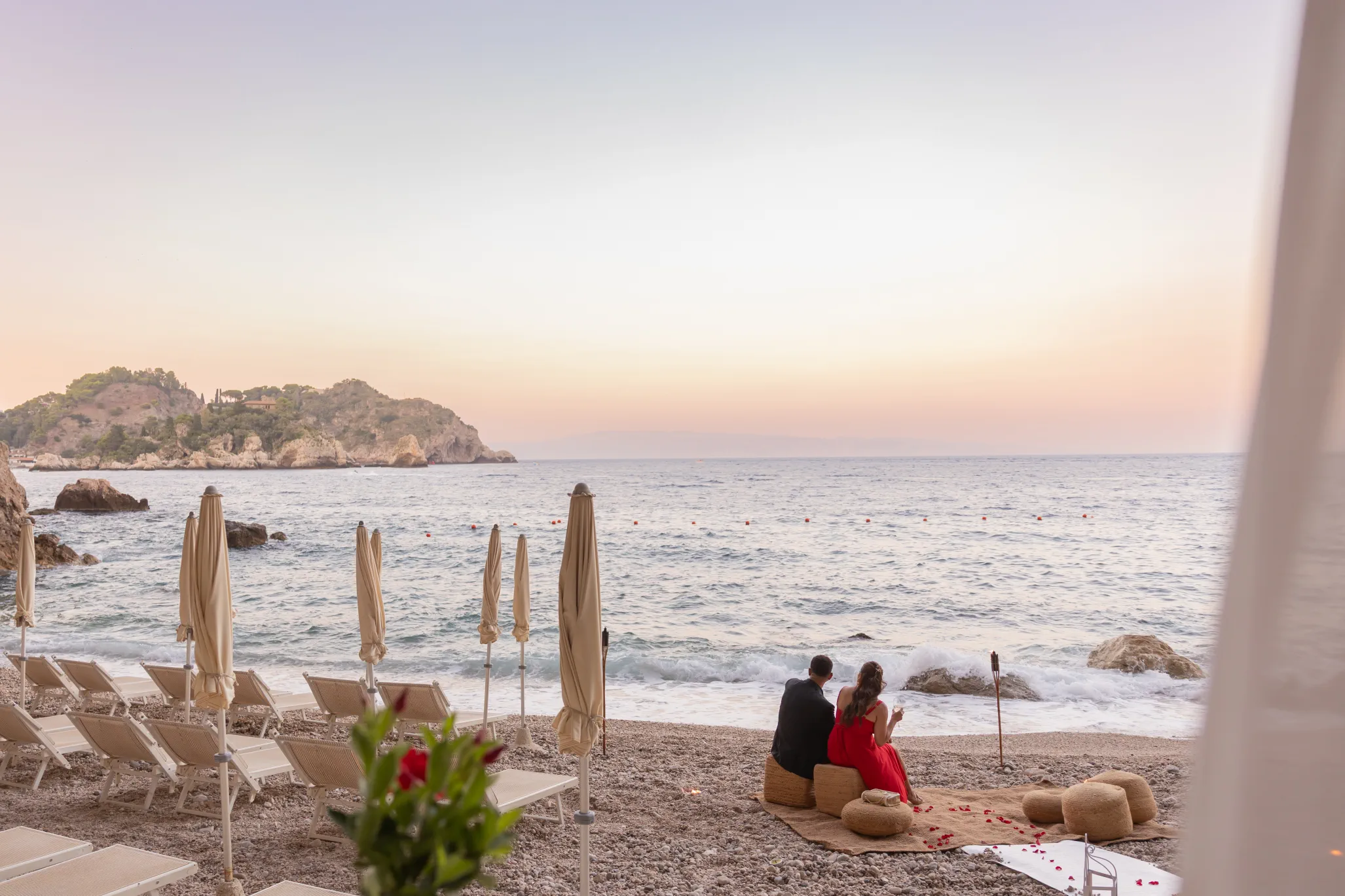 couple arriving at Capotaormina for their sunset proposal